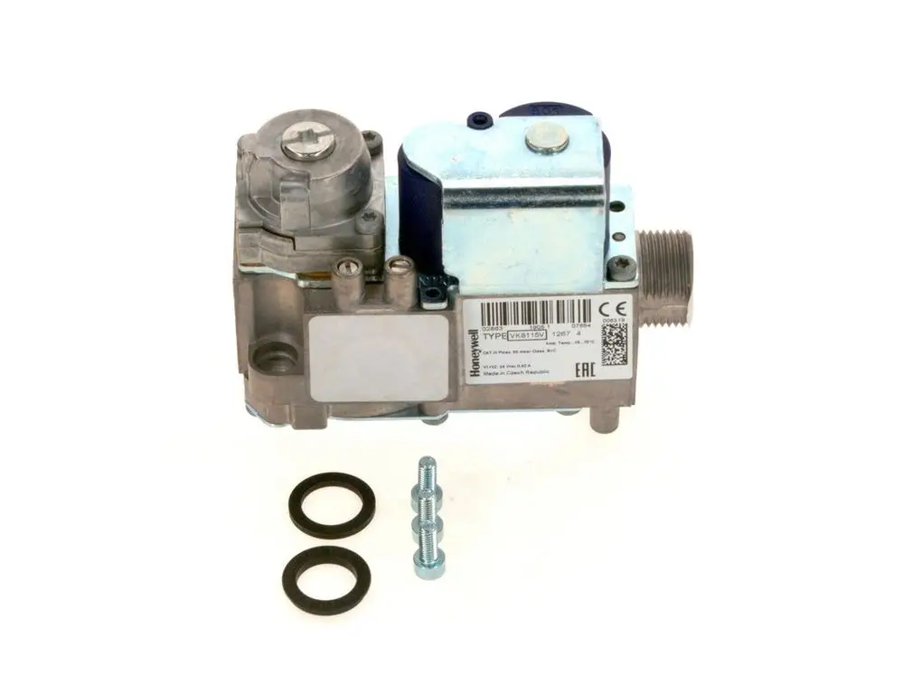 Bosch-Gasarmatur mit einem Metallgehäuse, Anschlüssen für Gasleitungen und mehreren Dichtungsringen zur sicheren Verbindung. Gerät für Heizungsanlagen konzipiert.